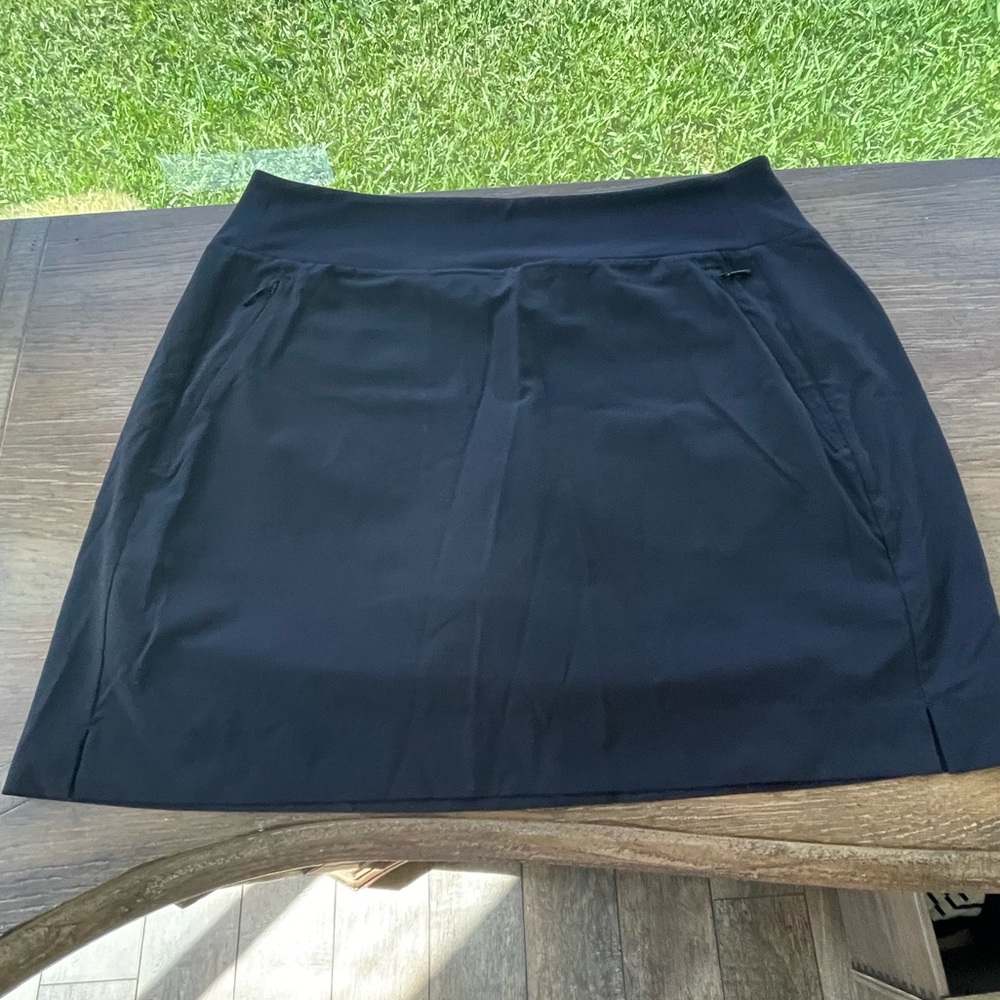 Athleta black skort with zippered front pockets